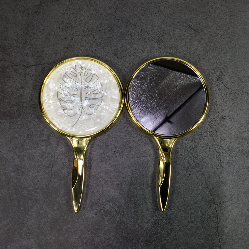 Spiegel mit Blattmuster-Griff, tragbarer runder Handspiegel