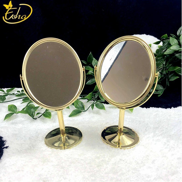 Goldfarbener Mini-Kosmetikspiegel mit rundem Tisch